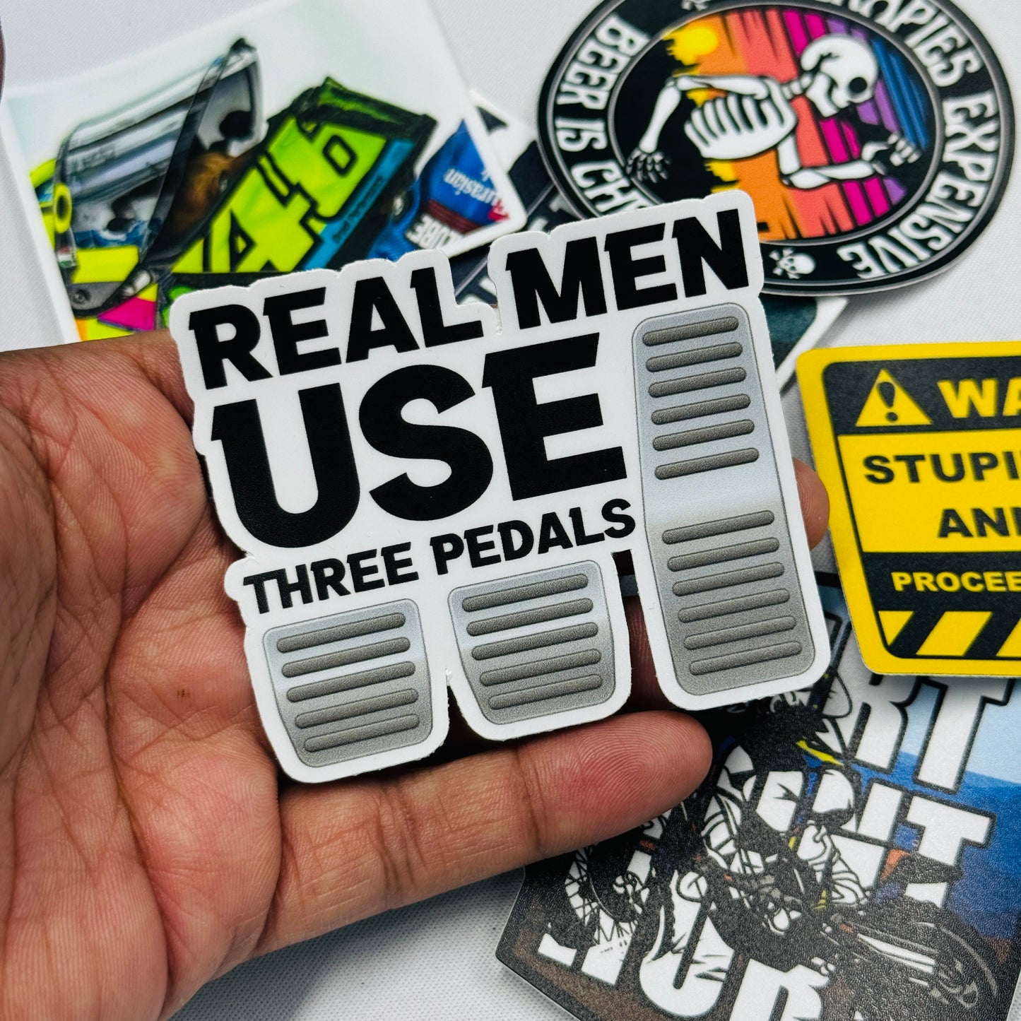 Real men use three pedals sticker